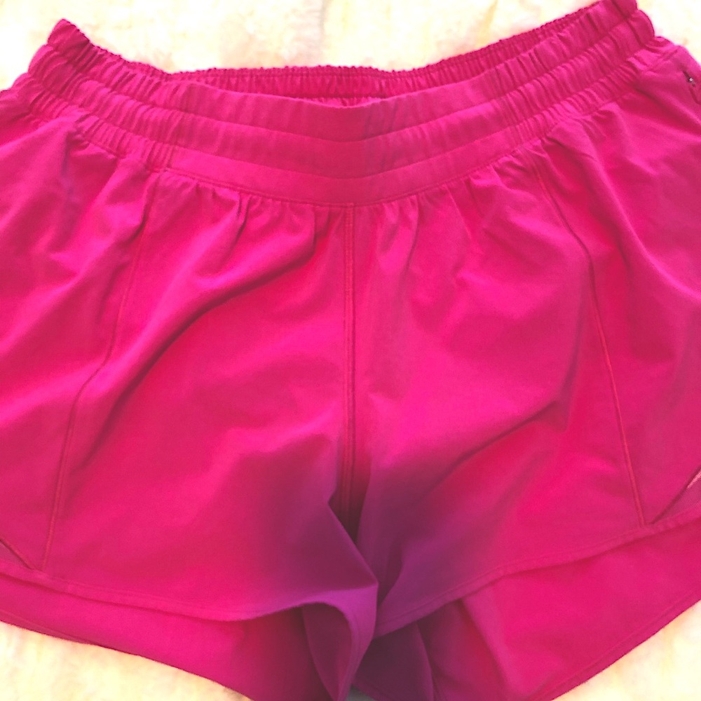 Lululemon hot pink (I believe sonic pink) size 10 4” Hottty Hot shorts